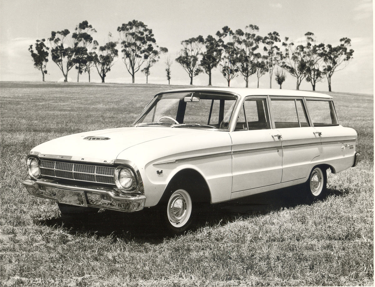 This archival image documents the 1964 Ford XM Falcon Station Wagon in scenic field with trees and is preserved in the Ford Heritage Vault as part of Ford Motor Company's historic photographic archive. Free for personal, non-commercial use. Ford H...