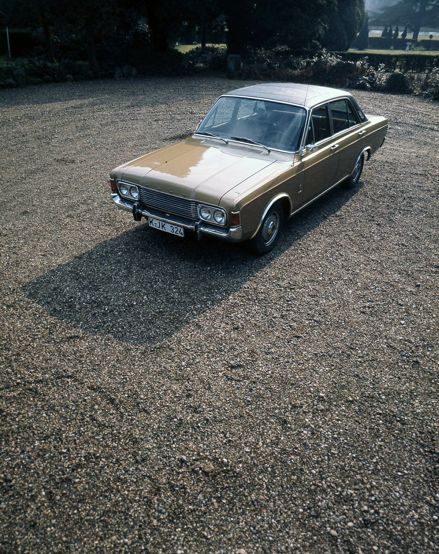 This archival image documents the 1969 Ford Taunus 20M aerial view on gravel road and is preserved in the Ford Heritage Vault as part of Ford Motor Company's historic photographic archive. Free for personal, non-commercial use. Ford Heritage Vault...