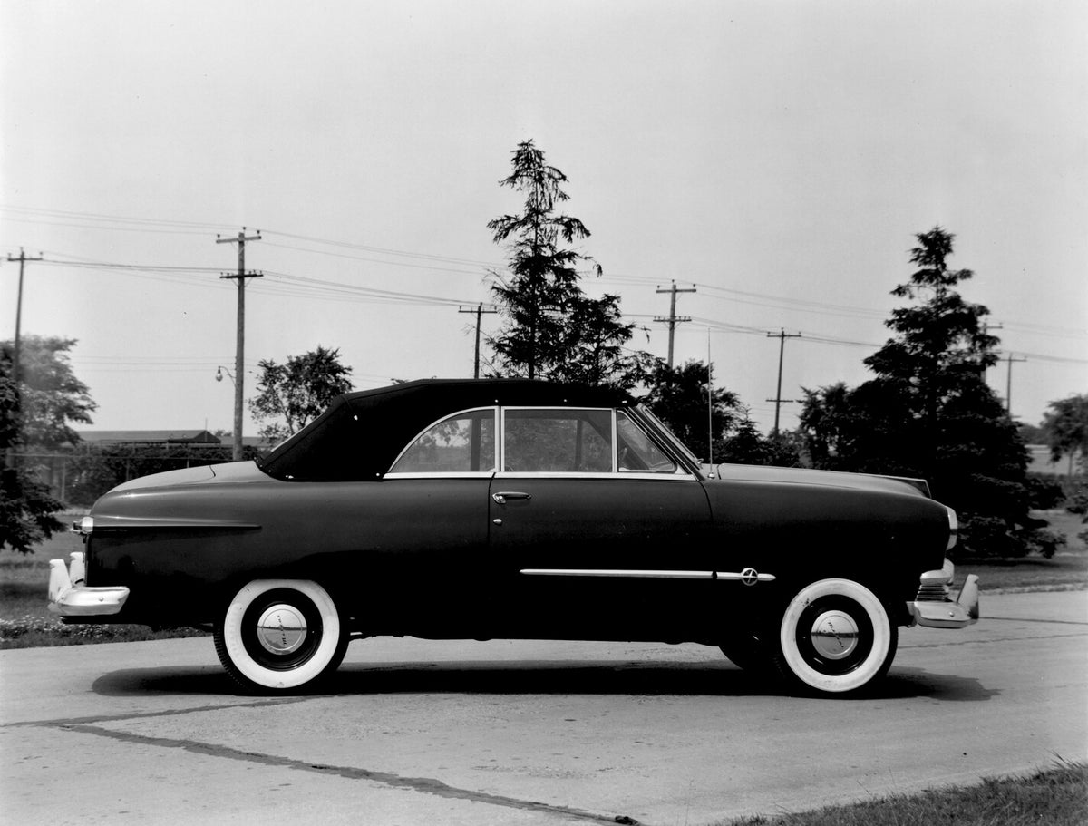 This archival image documents the 1951 Meteor Convertible side view on scenic road with trees AR-2007-5 and is preserved in the Ford Heritage Vault as part of Ford Motor Company's historic photographic archive. Free for personal, non-commercial us...