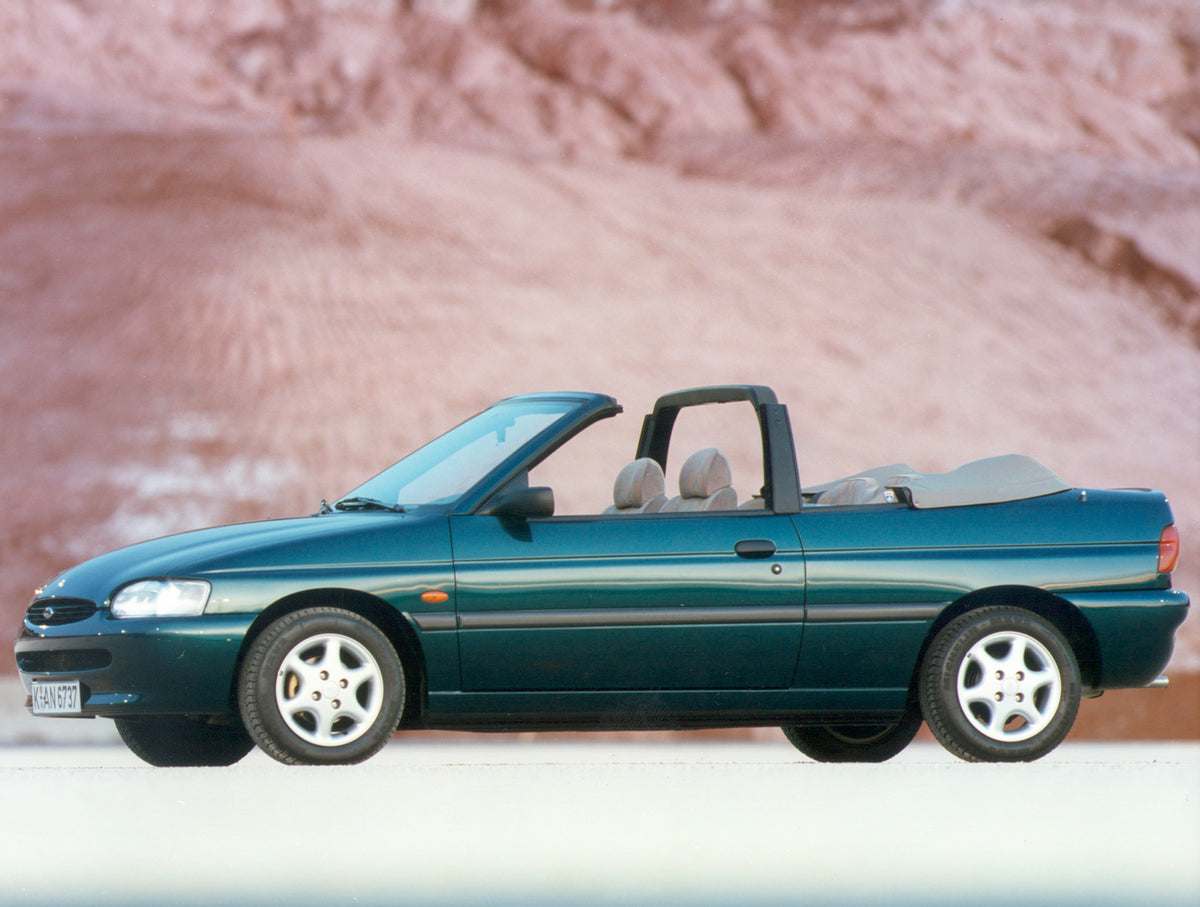 This archival image documents the 1995 Ford Escort Mark V Cabriolet scenic side view EscortCabrio_1995_01 and is preserved in the Ford Heritage Vault as part of Ford Motor Company's historic photographic archive. Free for personal, non-commercial ...