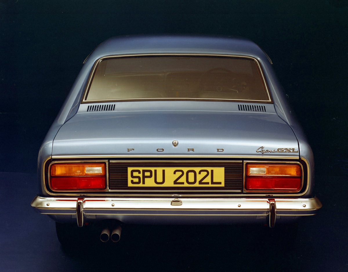 This archival image documents the 1973 Ford Capri MK I GXL rear view in studio and is preserved in the Ford Heritage Vault as part of Ford Motor Company's historic photographic archive. Free for personal, non-commercial use. Ford Heritage Vault re...