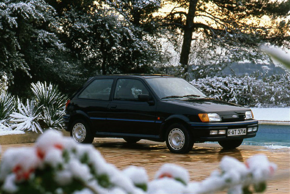 This archival image documents the 1989 Ford Fiesta Mark III LHD on snowy pool deck and is preserved in the Ford Heritage Vault as part of Ford Motor Company's historic photographic archive. Free for personal, non-commercial use. Ford Heritage Vaul...