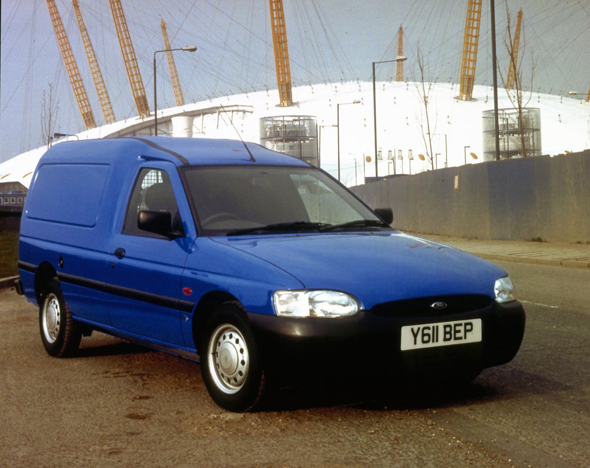 This archival image documents the 2001 Ford Escort Mark VI van in front of industrial building and is preserved in the Ford Heritage Vault as part of Ford Motor Company's historic photographic archive. Free for personal, non-commercial use. Ford H...