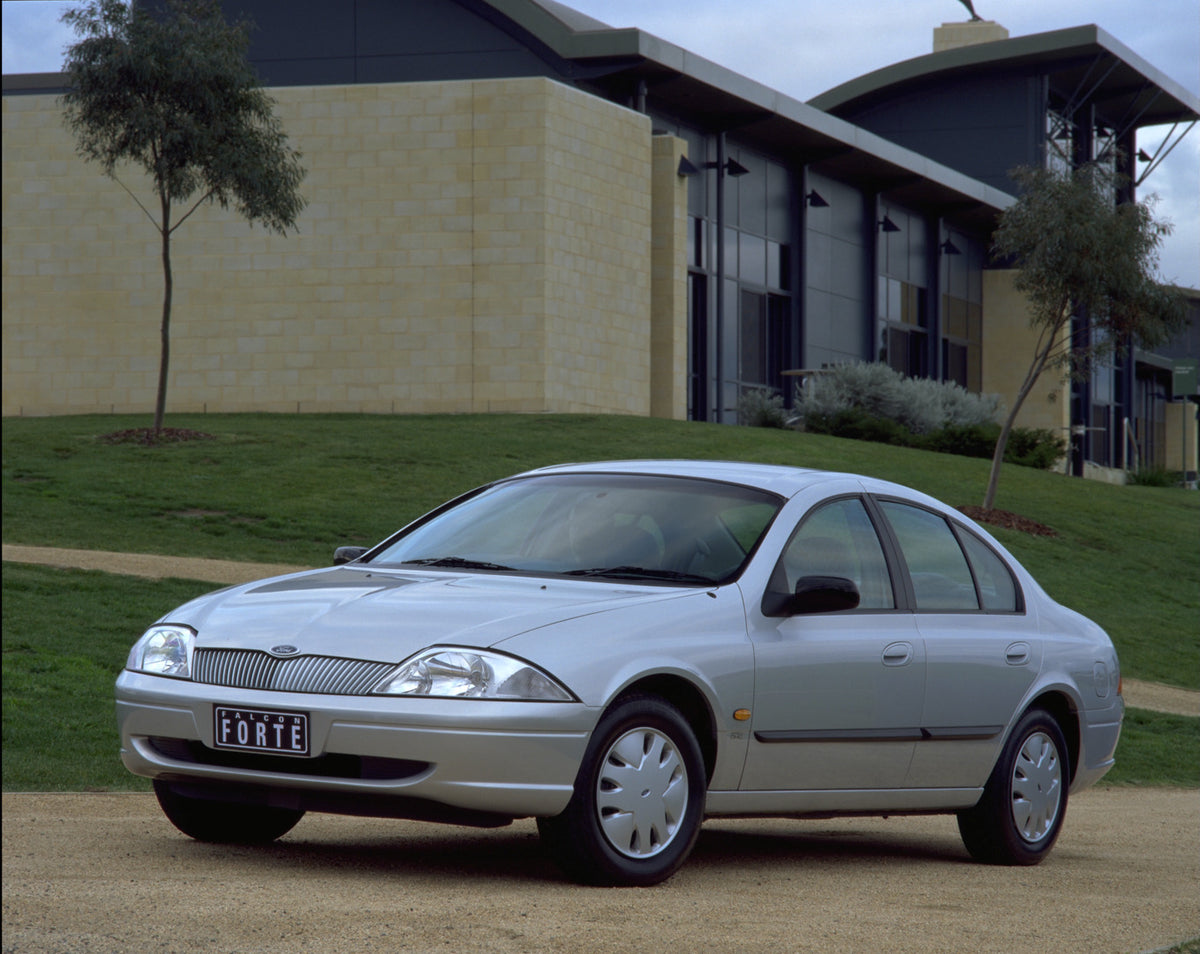 This archival image documents the 1998 Ford Falcon Forte in front of scenic building and is preserved in the Ford Heritage Vault as part of Ford Motor Company's historic photographic archive. Free for personal, non-commercial use. Ford Heritage Va...