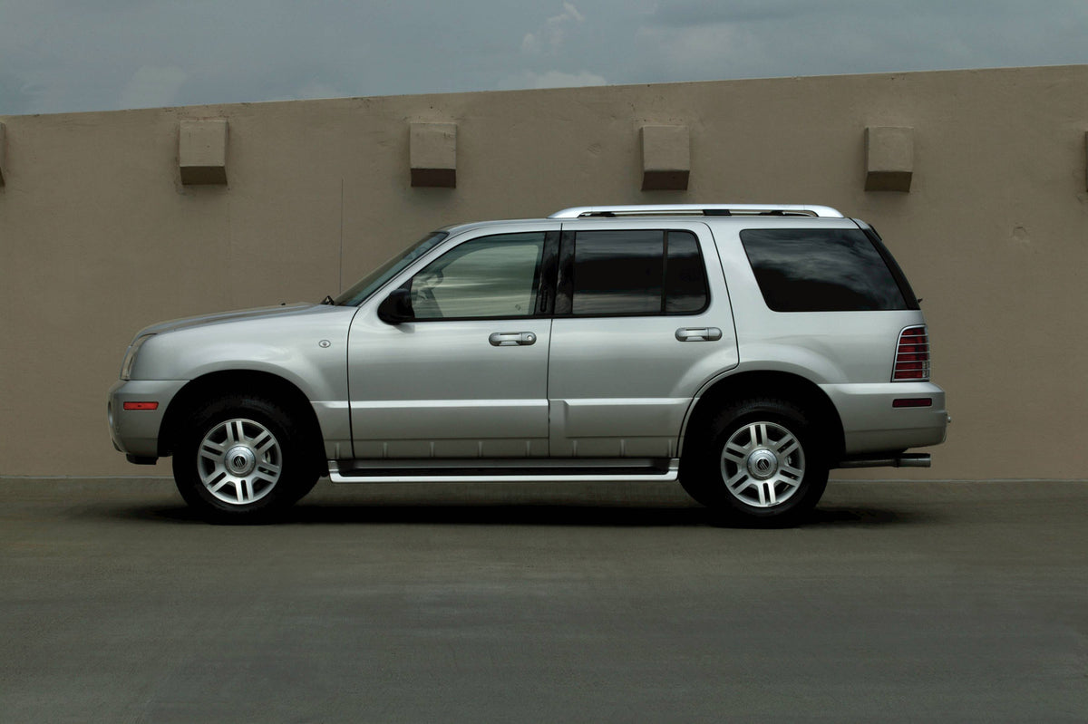 This archival image documents the 2004 Mercury Mountaineer Side View and is preserved in the Ford Heritage Vault as part of Ford Motor Company's historic photographic archive. Free for personal, non-commercial use. Ford Heritage Vault reference AR...