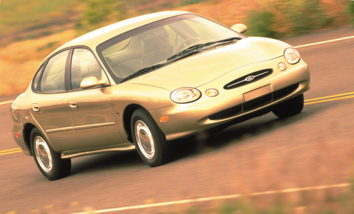 This archival image documents the 1999 Ford Taurus and is preserved in the Ford Heritage Vault as part of Ford Motor Company's historic photographic archive. Free for personal, non-commercial use. Ford Heritage Vault reference AR-2008-8.1.2.7465.