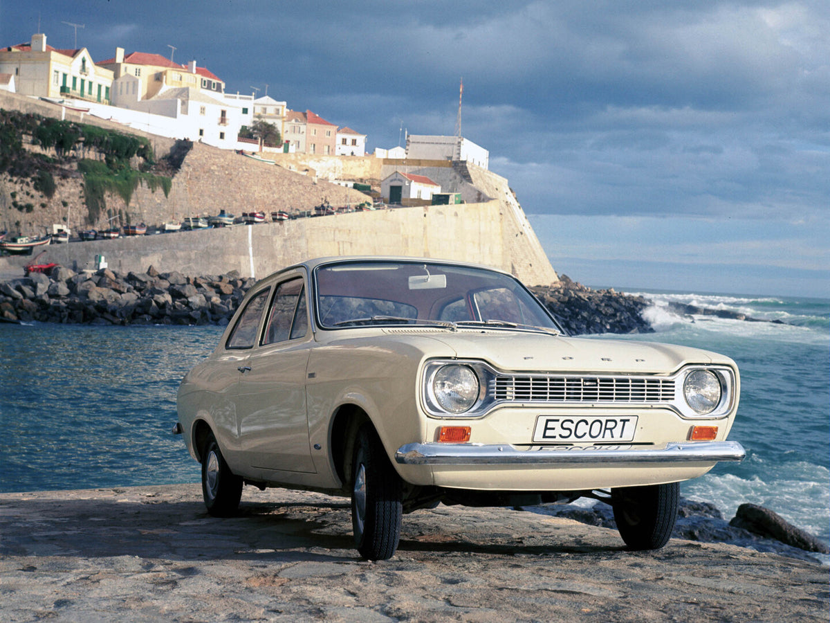 This archival image documents the 1967 Ford Escort MK1 front view with ocean and town in background 1967-984 and is preserved in the Ford Heritage Vault as part of Ford Motor Company's historic photographic archive. Free for personal, non-commerci...