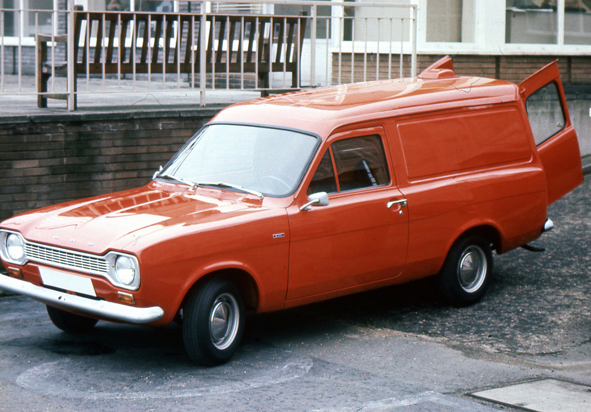 This archival image documents the 1971 Ford Escort Mark I 6 Counterweight Van LHD in front of building with open back doors and is preserved in the Ford Heritage Vault as part of Ford Motor Company's historic photographic archive. Free for persona...