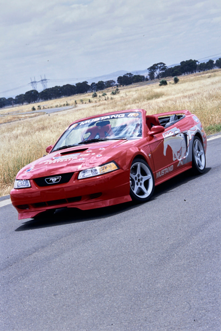 This archival image documents the 2001 Ford FTE Mustang Cobra Driver Side Front End View on Race Track FAP-2011-3 and is preserved in the Ford Heritage Vault as part of Ford Motor Company's historic photographic archive. Free for personal, non-com...