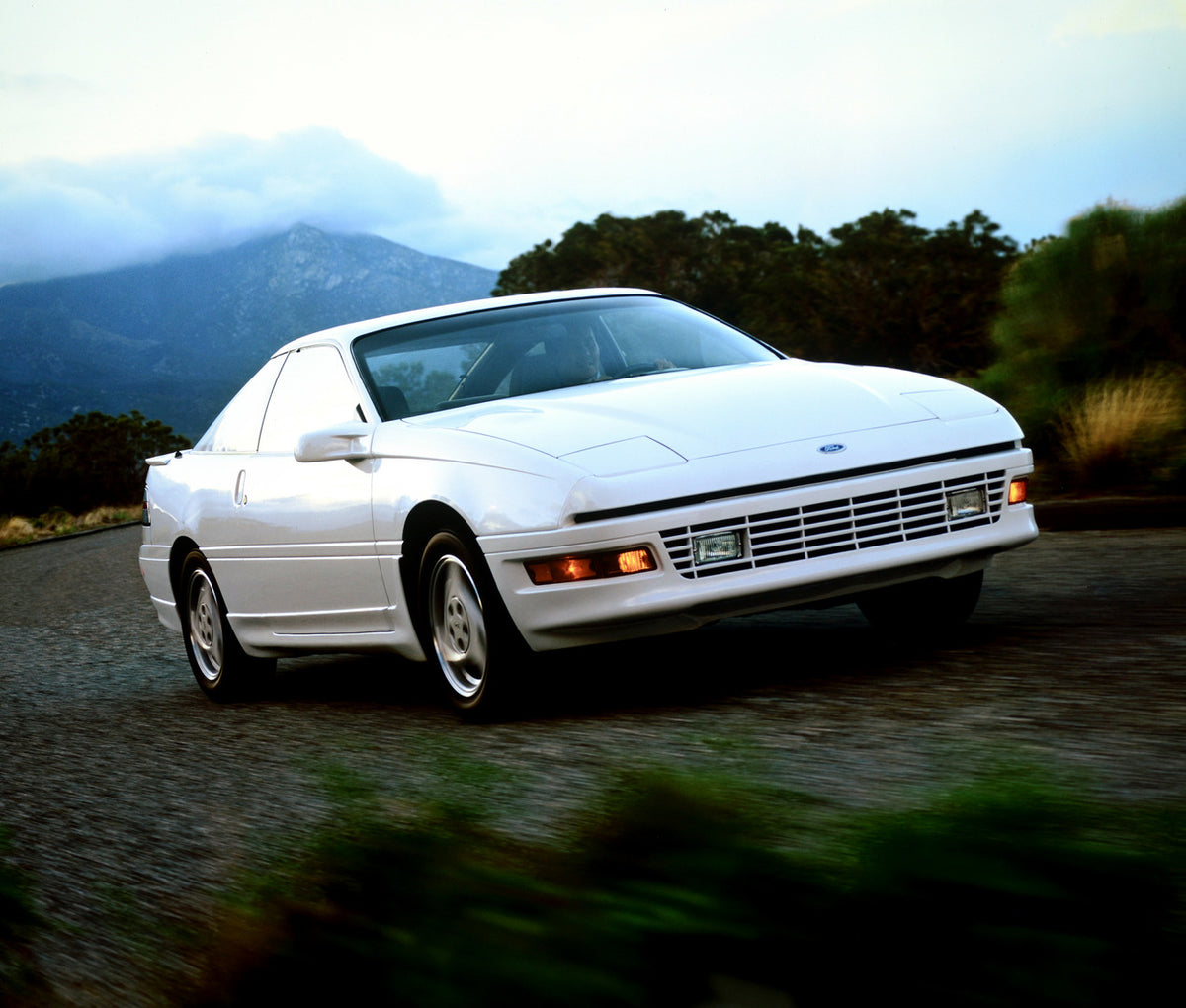 This archival image documents the 1991 Ford Probe two-door and is preserved in the Ford Heritage Vault as part of Ford Motor Company's historic photographic archive. Free for personal, non-commercial use. Ford Heritage Vault reference AR-2001-94-2...