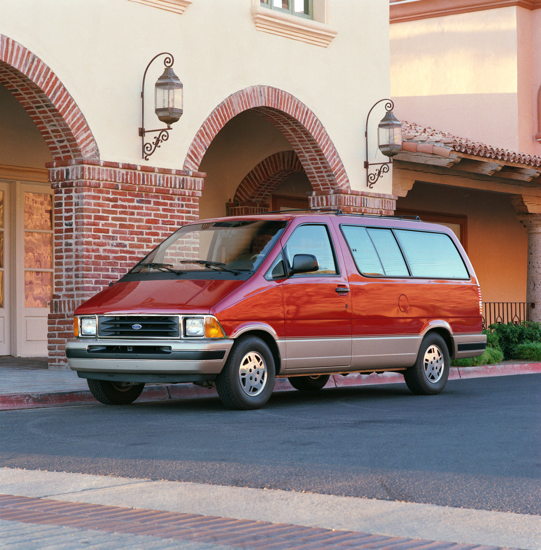 This archival image documents the 1990 Ford Aerostar extended length van and is preserved in the Ford Heritage Vault as part of Ford Motor Company's historic photographic archive. Free for personal, non-commercial use. Ford Heritage Vault referenc...