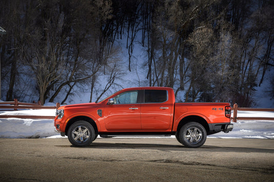 2024 Ford Ranger Lariat side view with scenic trees in winter HV 2024-0009