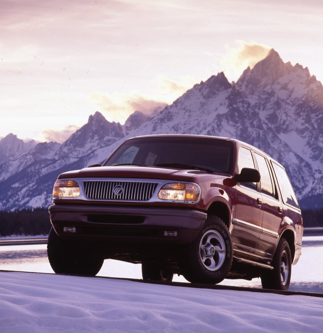 This archival image documents the 1997 Mercury Mountaineer front view with mountains in background CN325018-161 and is preserved in the Ford Heritage Vault as part of Ford Motor Company's historic photographic archive. Free for personal, non-comme...