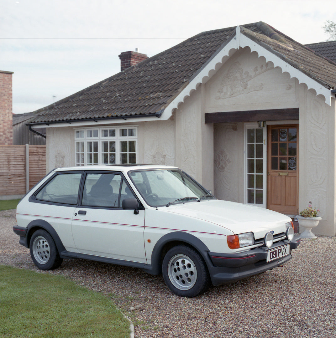 This archival image documents the 1986 Ford Fiesta Mark II XR2 in front of house and is preserved in the Ford Heritage Vault as part of Ford Motor Company's historic photographic archive. Free for personal, non-commercial use. Ford Heritage Vault ...