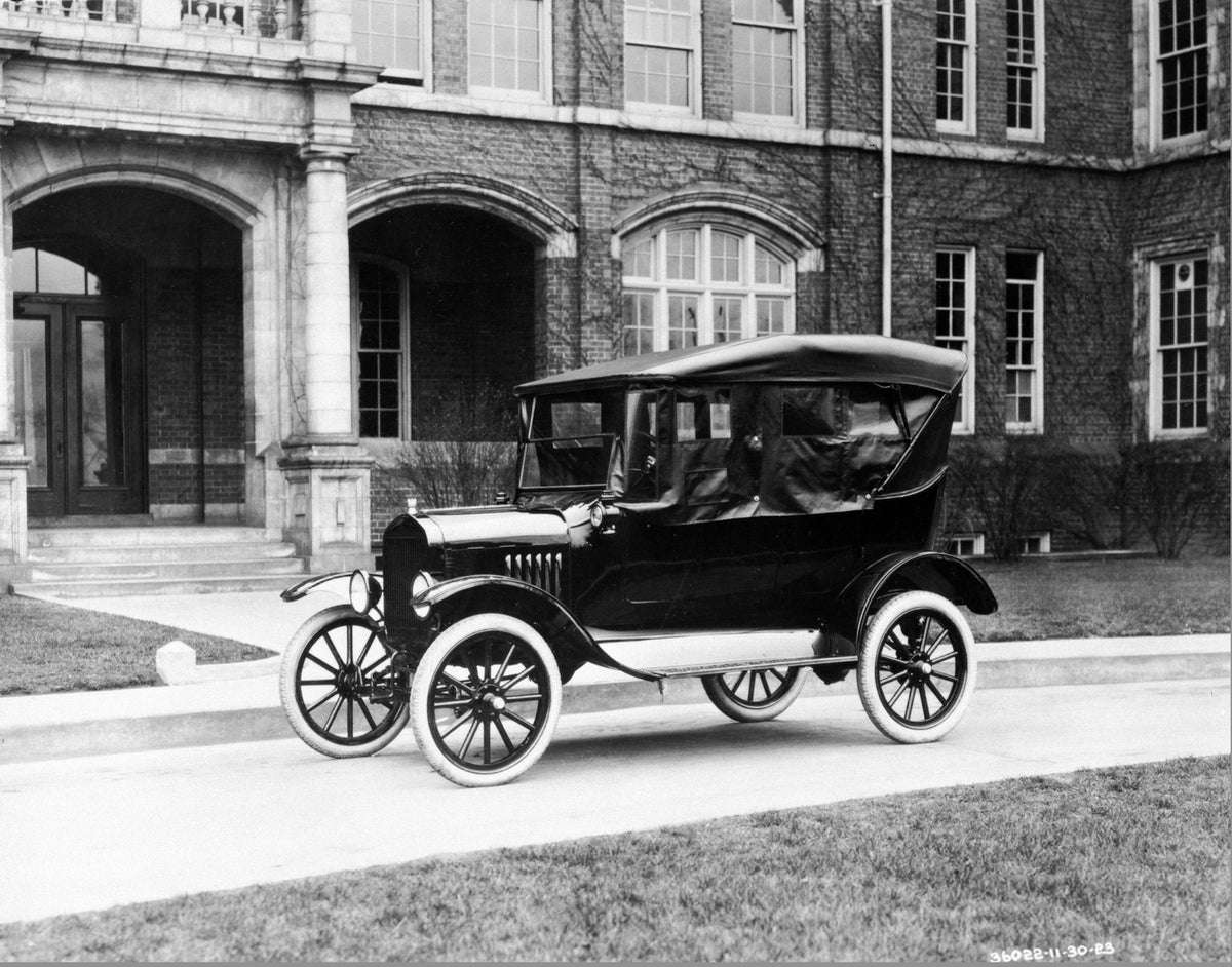 This archival image documents the 1923 Ford Model T Touring with curtains installed and is preserved in the Ford Heritage Vault as part of Ford Motor Company's historic photographic archive. Free for personal, non-commercial use. Ford Heritage Vau...
