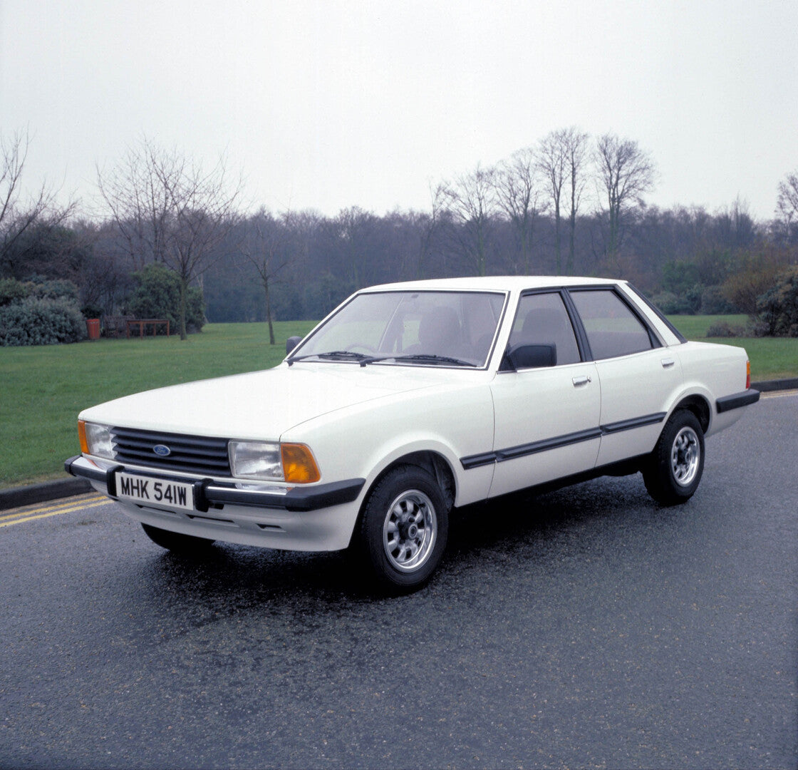 This archival image documents the 1980 Ford Cortina MK V on scenic road and is preserved in the Ford Heritage Vault as part of Ford Motor Company's historic photographic archive. Free for personal, non-commercial use. Ford Heritage Vault reference...