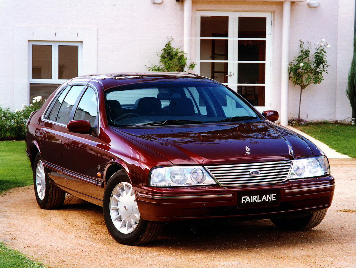 This archival image documents the 2000 Ford Falcon AU II Fairlane Ghia closeup in front of scenic house and is preserved in the Ford Heritage Vault as part of Ford Motor Company's historic photographic archive. Free for personal, non-commercial us...