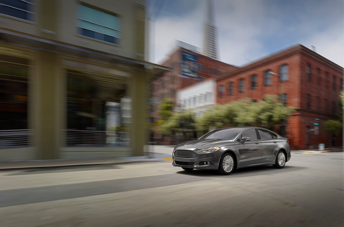 This archival image documents the 2015 Ford Fusion Hybrid action shot in city and is preserved in the Ford Heritage Vault as part of Ford Motor Company's historic photographic archive. Free for personal, non-commercial use. Ford Heritage Vault ref...