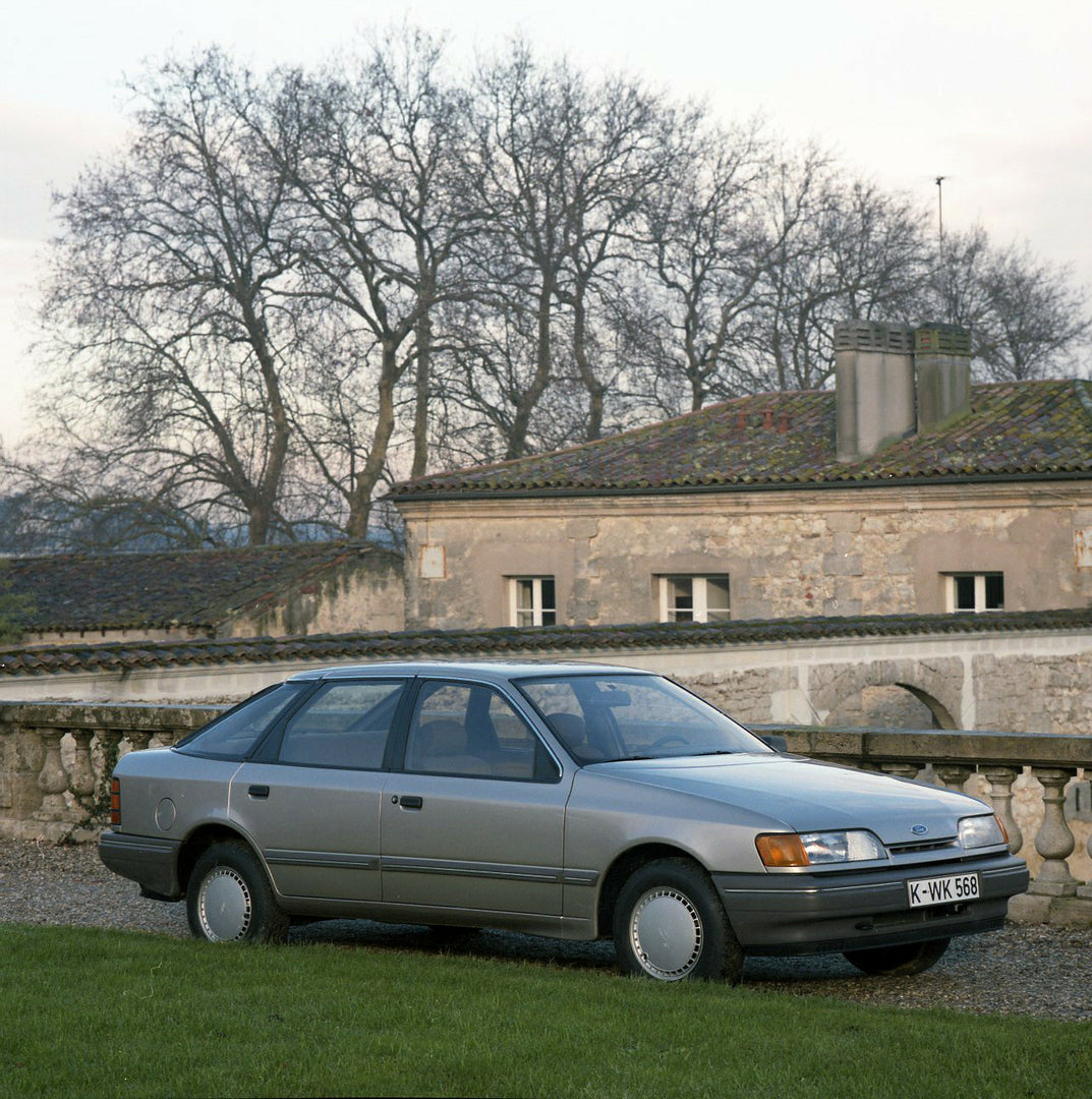 This archival image documents the 1984 Ford Scorpio Mark I LHD in scenic driveway in Bordeaux and is preserved in the Ford Heritage Vault as part of Ford Motor Company's historic photographic archive. Free for personal, non-commercial use. Ford He...