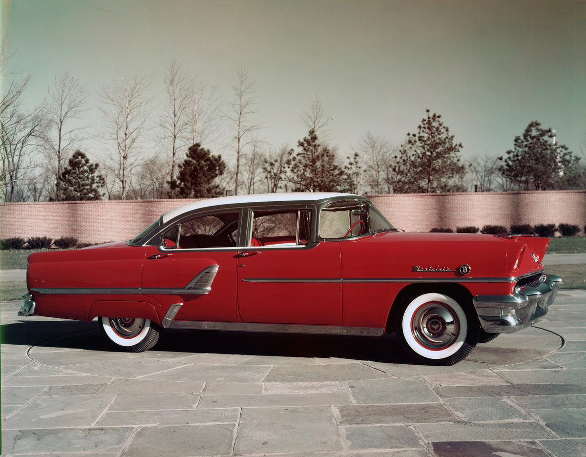 This archival image documents the 1955 Mercury Montclair four-door sedan with Trees in Background and is preserved in the Ford Heritage Vault as part of Ford Motor Company's historic photographic archive. Free for personal, non-commercial use. For...