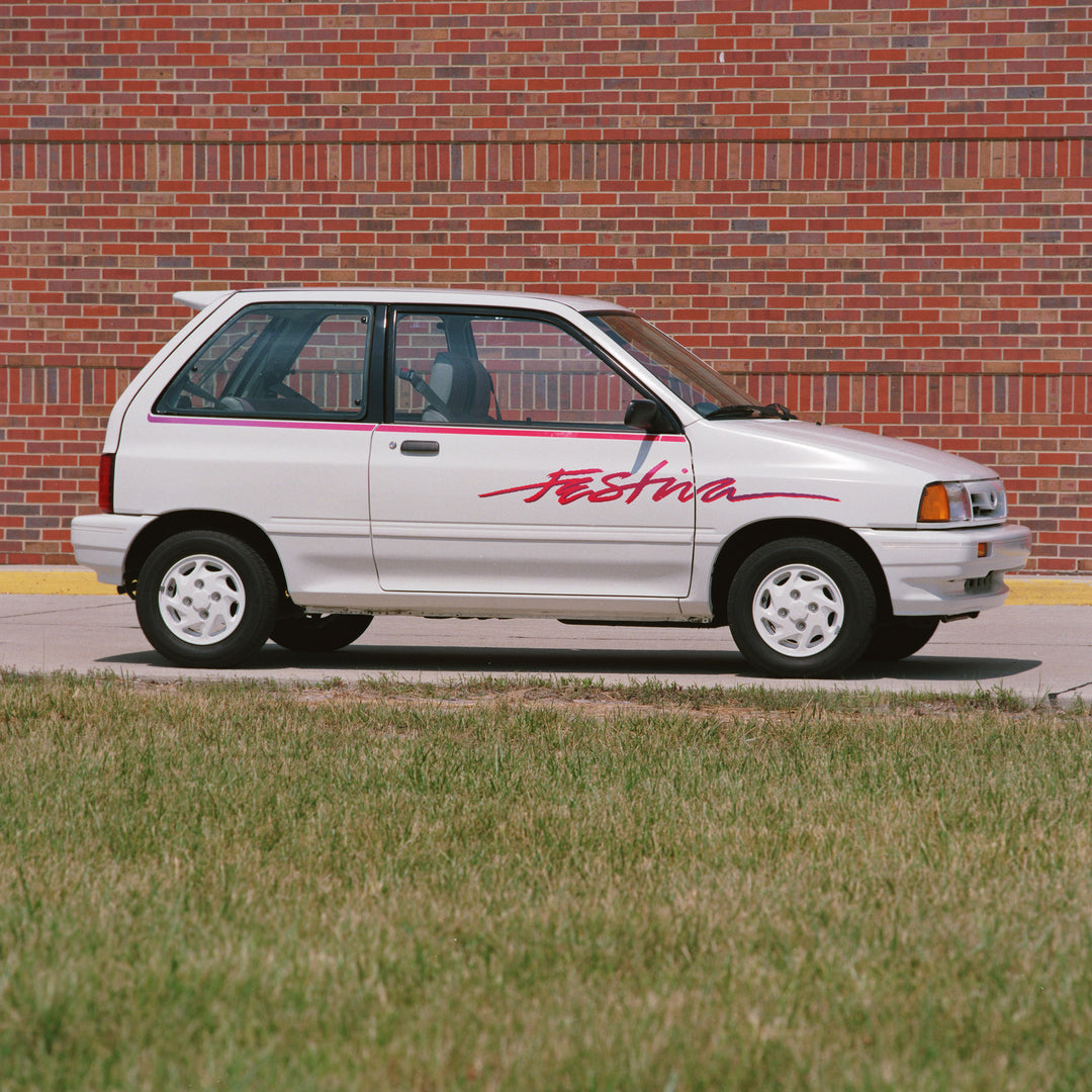 This archival image documents the 1992 Ford Festiva and is preserved in the Ford Heritage Vault as part of Ford Motor Company's historic photographic archive. Free for personal, non-commercial use. Ford Heritage Vault reference AR-2008-8.1.2.7077.