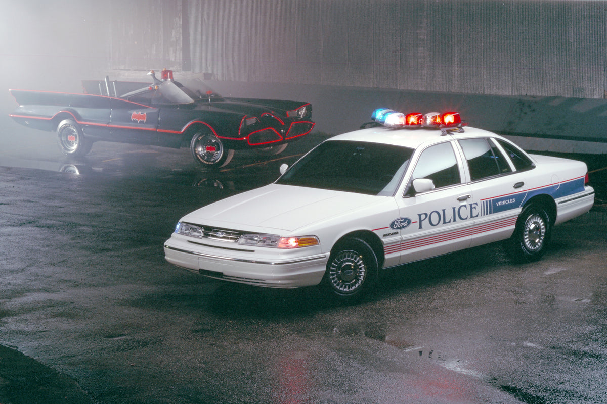 This archival image documents the 1996 Ford Crown Victoria police car and Batmobile and is preserved in the Ford Heritage Vault as part of Ford Motor Company's historic photographic archive. Free for personal, non-commercial use. Ford Heritage Vau...