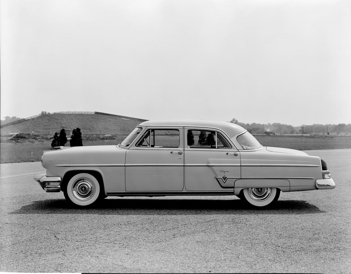 This archival image documents the 1954 Lincoln Capri four door and is preserved in the Ford Heritage Vault as part of Ford Motor Company's historic photographic archive. Free for personal, non-commercial use. Ford Heritage Vault reference AR-2008-...