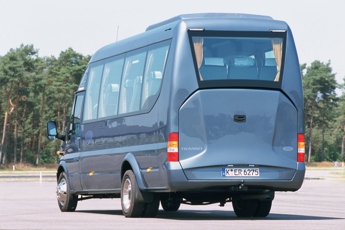 This archival image documents the 2003 Ford Transit Bonito Mark IV 17 Seat Bus Conversion rear view in scenic parking lot and is preserved in the Ford Heritage Vault as part of Ford Motor Company's historic photographic archive. Free for personal,...