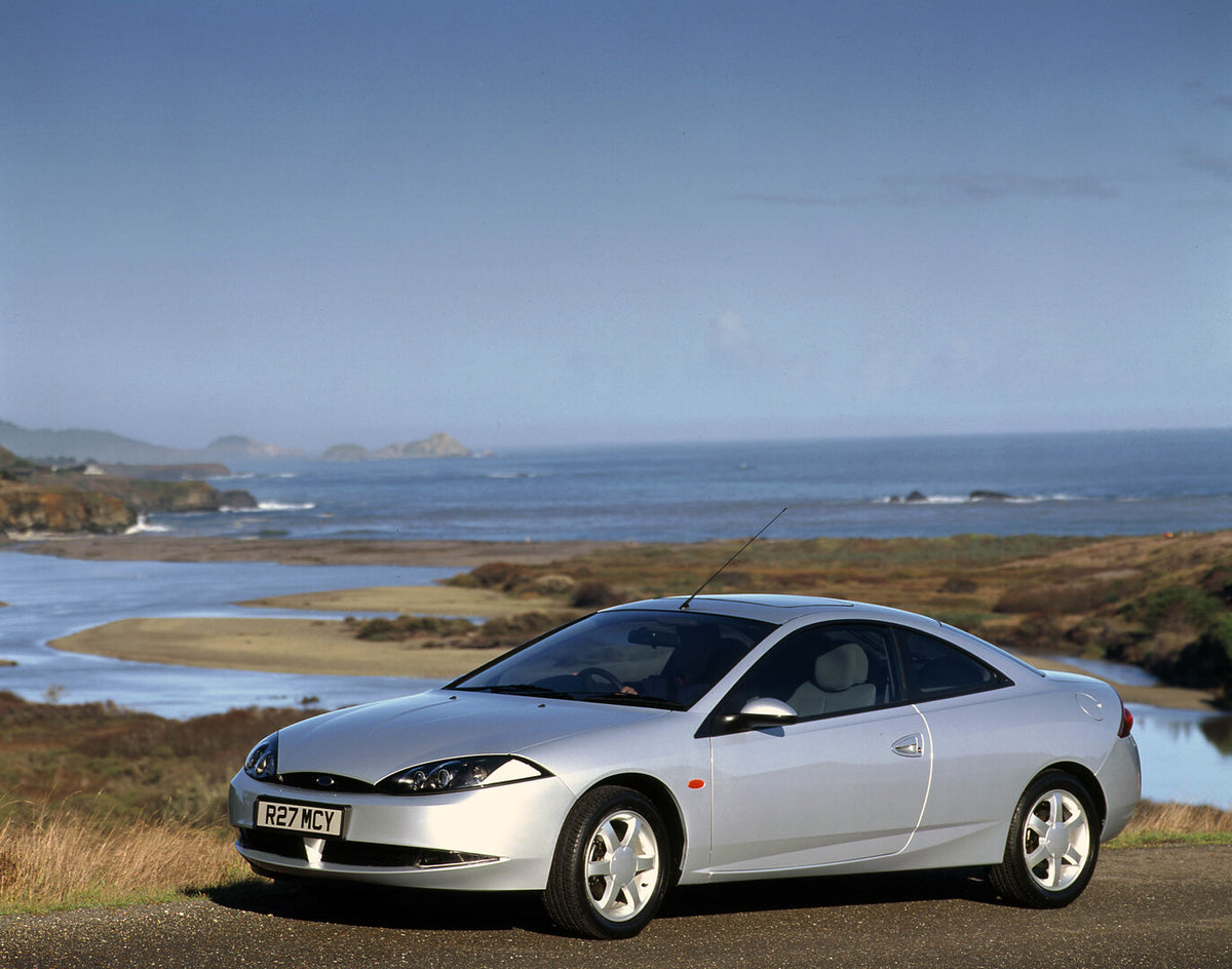 This archival image documents the 1998 Ford Cougar side view scenic 1998-70-8 and is preserved in the Ford Heritage Vault as part of Ford Motor Company's historic photographic archive. Free for personal, non-commercial use. Ford Heritage Vault ref...