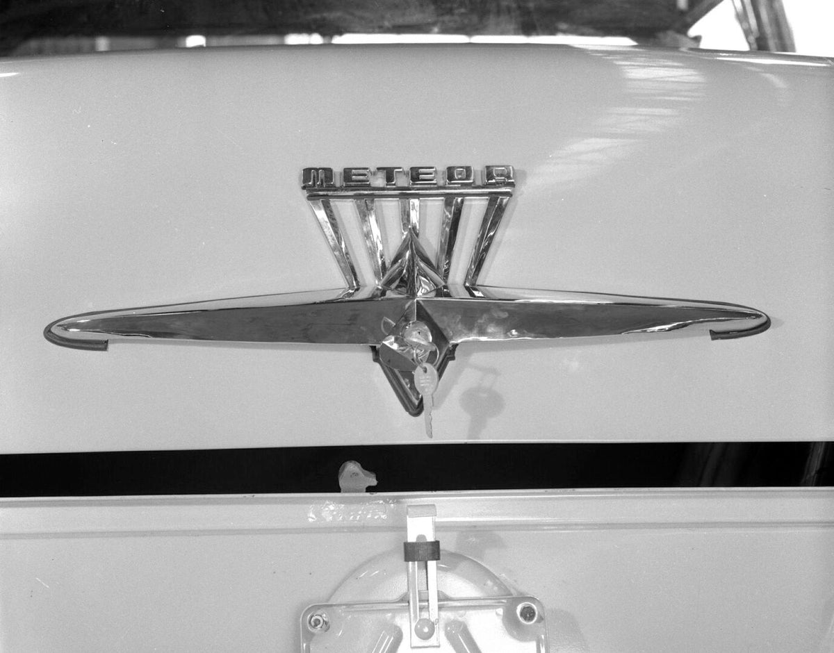This archival image documents the 1953 Meteor Crestline Victoria Coupe trunk with key closeup AR-2007-5 and is preserved in the Ford Heritage Vault as part of Ford Motor Company's historic photographic archive. Free for personal, non-commercial us...