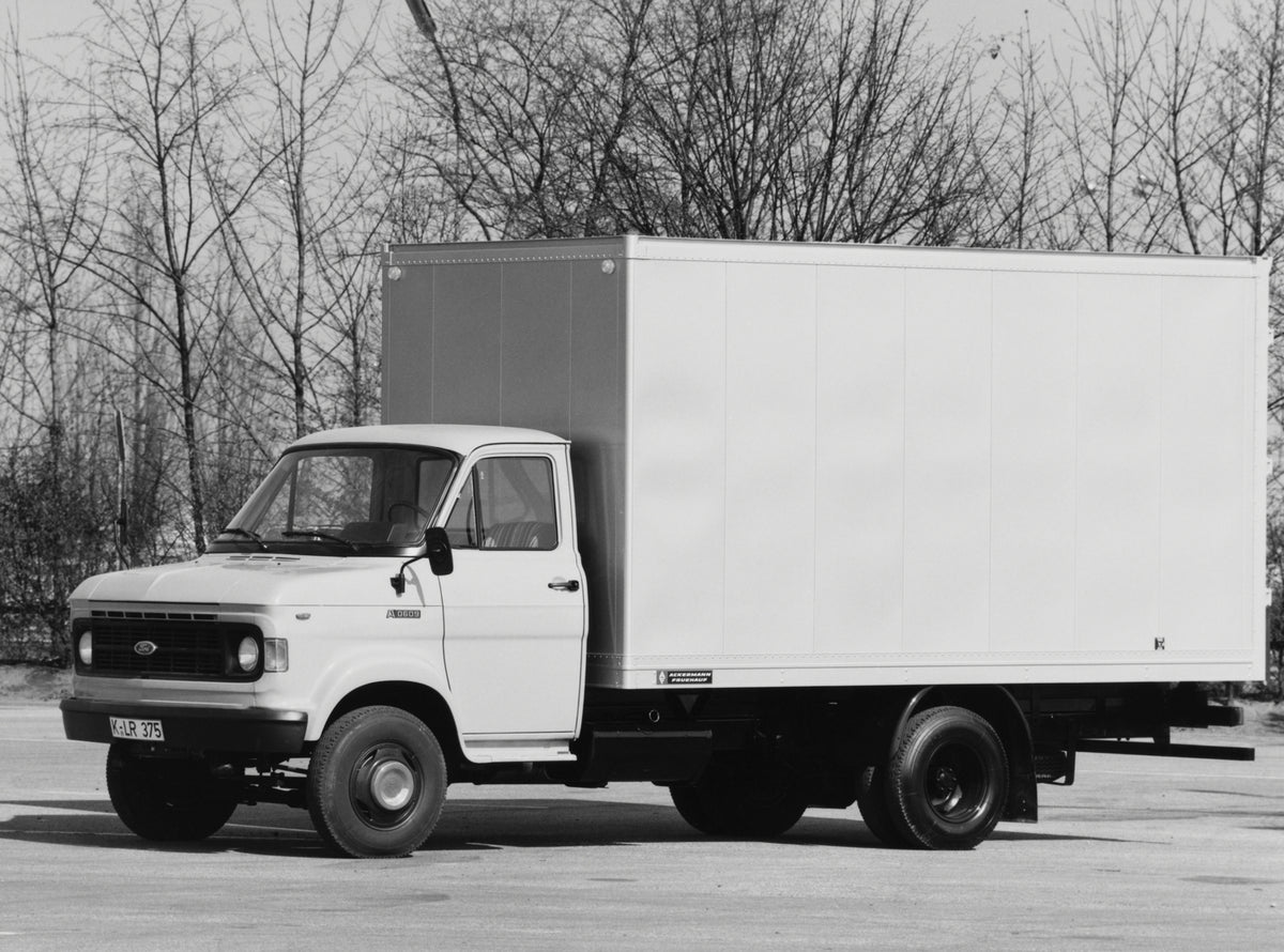 This archival image documents the 1970 Ford A-Series Truck with scenic trees and is preserved in the Ford Heritage Vault as part of Ford Motor Company's historic photographic archive. Free for personal, non-commercial use. Ford Heritage Vault refe...