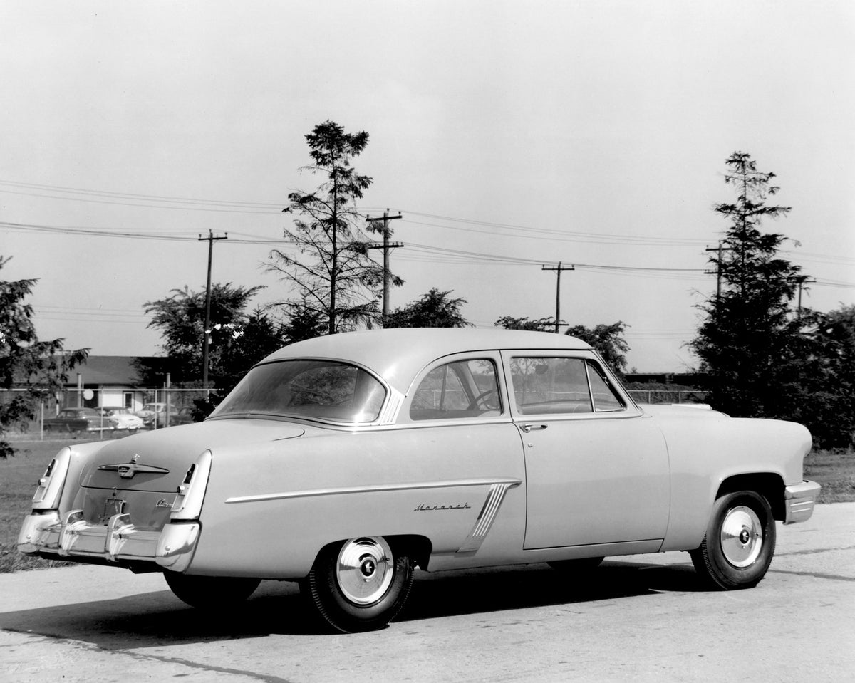 This archival image documents the 1952 Monarch Coupe rear view on scenic road AR-2007-5 and is preserved in the Ford Heritage Vault as part of Ford Motor Company's historic photographic archive. Free for personal, non-commercial use. Ford Heritage...