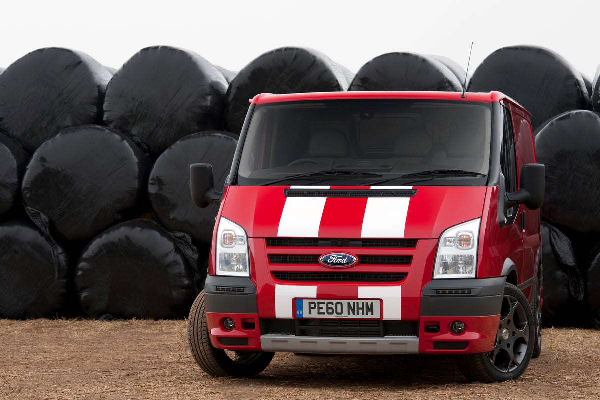 This archival image documents the 2010 Ford Transit Mark IV 140 SportVan front view and is preserved in the Ford Heritage Vault as part of Ford Motor Company's historic photographic archive. Free for personal, non-commercial use. Ford Heritage Vau...