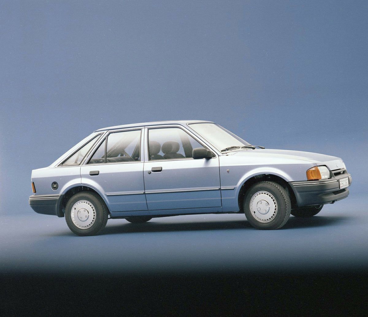 This archival image documents the 1986 Ford Escort Mark IV 1.6 Ghia LHD side view in studio and is preserved in the Ford Heritage Vault as part of Ford Motor Company's historic photographic archive. Free for personal, non-commercial use. Ford Heri...