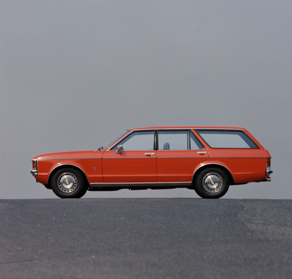 This archival image documents the 1975 Ford Granada Mark I GL side view with scenic blue sky and is preserved in the Ford Heritage Vault as part of Ford Motor Company's historic photographic archive. Free for personal, non-commercial use. Ford Her...