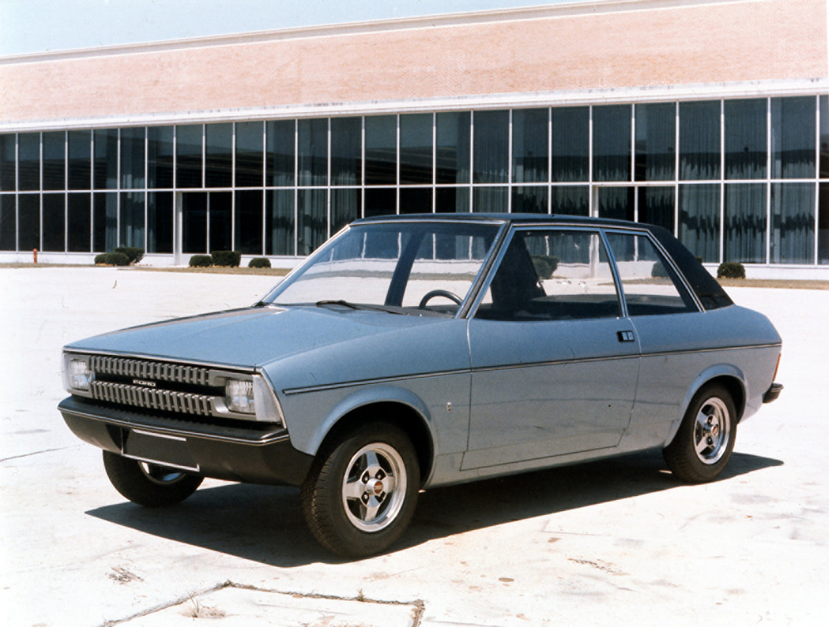 This archival image documents the 1977 Ford Fiesta Mark I in front of glass building and is preserved in the Ford Heritage Vault as part of Ford Motor Company's historic photographic archive. Free for personal, non-commercial use. Ford Heritage Va...
