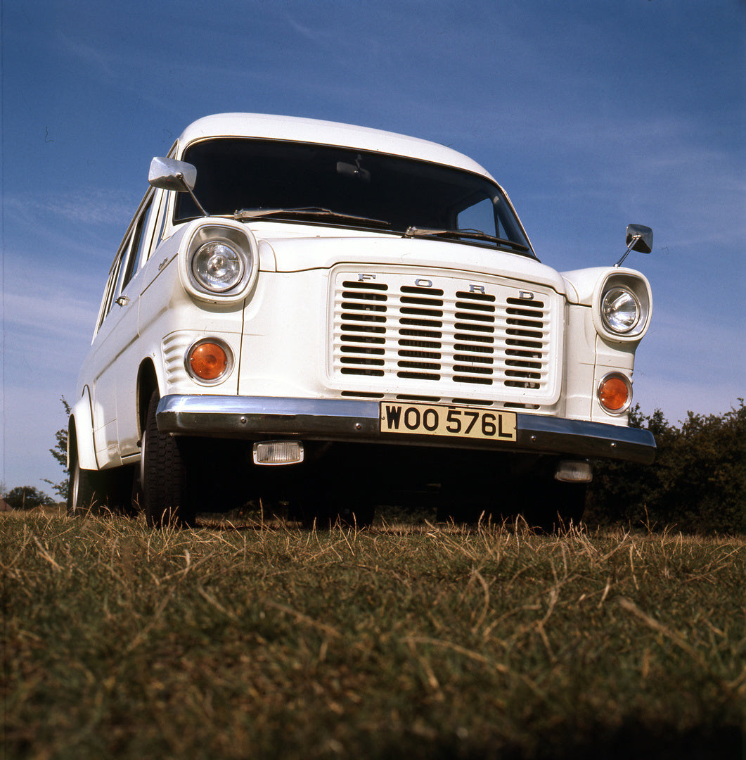 This archival image documents the 1973 Ford Transit Mark I 15 Seater Bus V6 scenic field front view and is preserved in the Ford Heritage Vault as part of Ford Motor Company's historic photographic archive. Free for personal, non-commercial use. F...