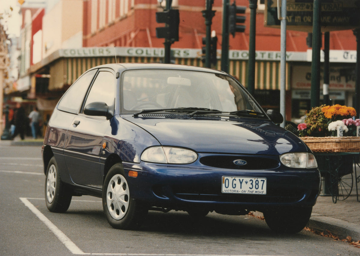 This archival image documents the 1997 Ford WD Festiva Driver Side Front End View on City Street FAP-2011-3 and is preserved in the Ford Heritage Vault as part of Ford Motor Company's historic photographic archive. Free for personal, non-commercia...