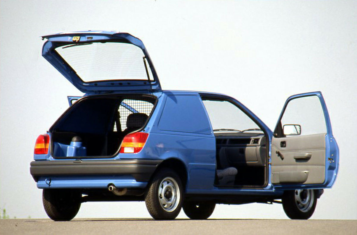 This archival image documents the 1989 Ford Fiesta Mark III Van rear view with open doors and is preserved in the Ford Heritage Vault as part of Ford Motor Company's historic photographic archive. Free for personal, non-commercial use. Ford Herita...