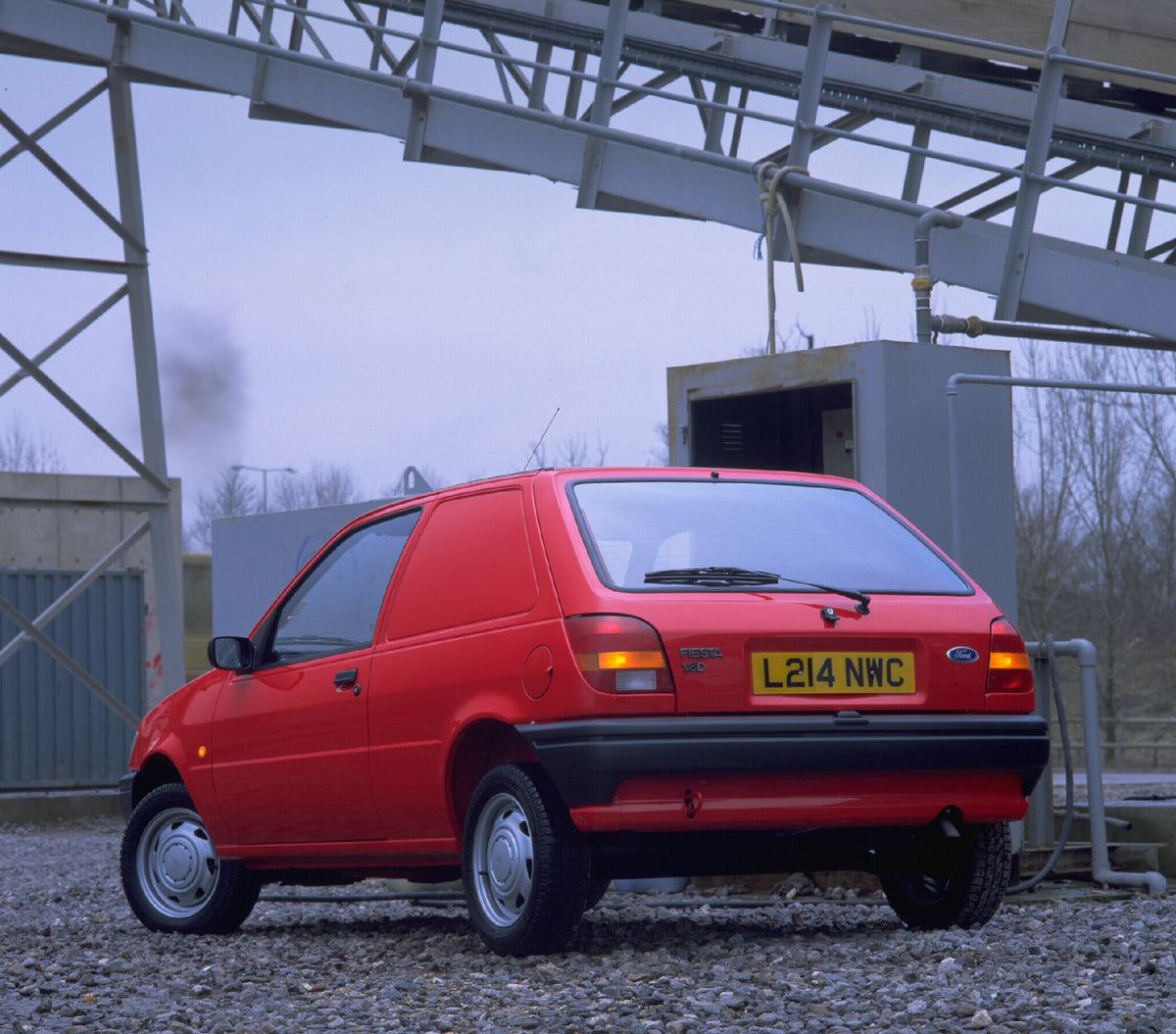 This archival image documents the 1994 Ford Fiesta Mark III rear view on industrial site AR-2002-213709 and is preserved in the Ford Heritage Vault as part of Ford Motor Company's historic photographic archive. Free for personal, non-commercial us...