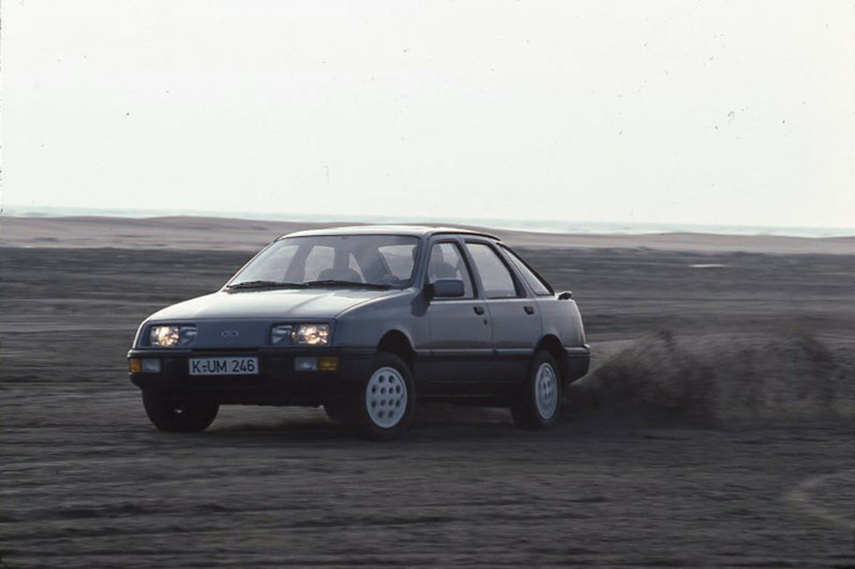 This archival image documents the 1985 Ford Sierra 2.0 IS LHD action shot on dirt road and is preserved in the Ford Heritage Vault as part of Ford Motor Company's historic photographic archive. Free for personal, non-commercial use. Ford Heritage ...