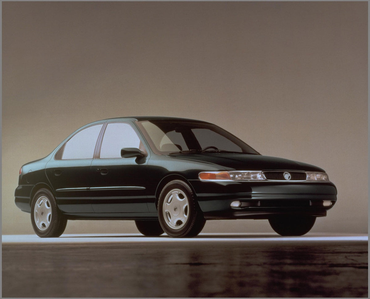 This archival image documents the 1995 Mercury Mystique front angle in studio AR-2002-213709 and is preserved in the Ford Heritage Vault as part of Ford Motor Company's historic photographic archive. Free for personal, non-commercial use. Ford Her...