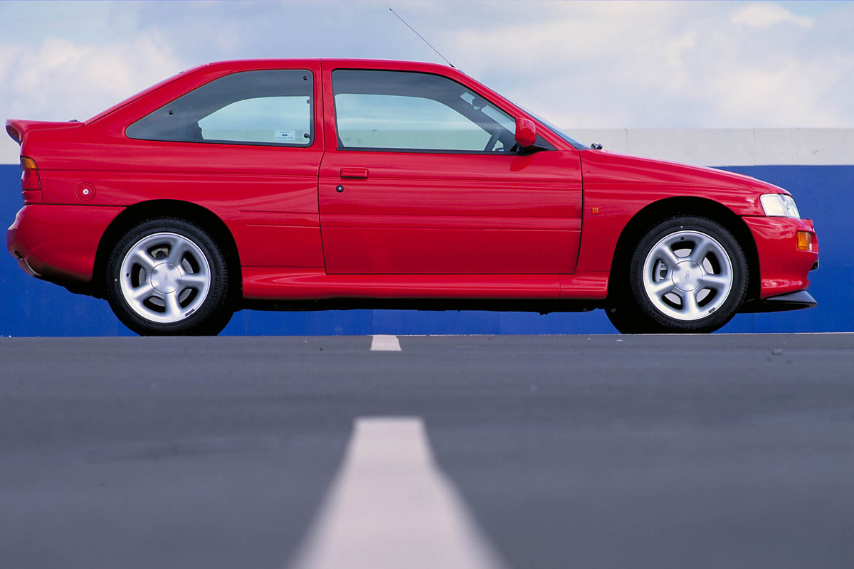 This archival image documents the 1994 Ford Escort Cosworth side view 1994-286-1 and is preserved in the Ford Heritage Vault as part of Ford Motor Company's historic photographic archive. Free for personal, non-commercial use. Ford Heritage Vault ...