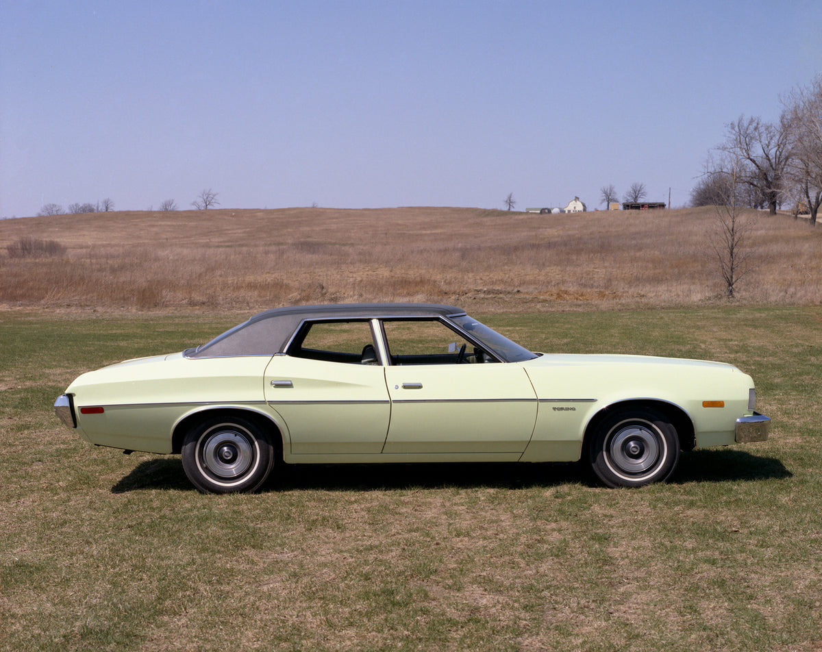 This archival image documents the 1973 Ford Torino four-door sedan and is preserved in the Ford Heritage Vault as part of Ford Motor Company's historic photographic archive. Free for personal, non-commercial use. Ford Heritage Vault reference AR-2...