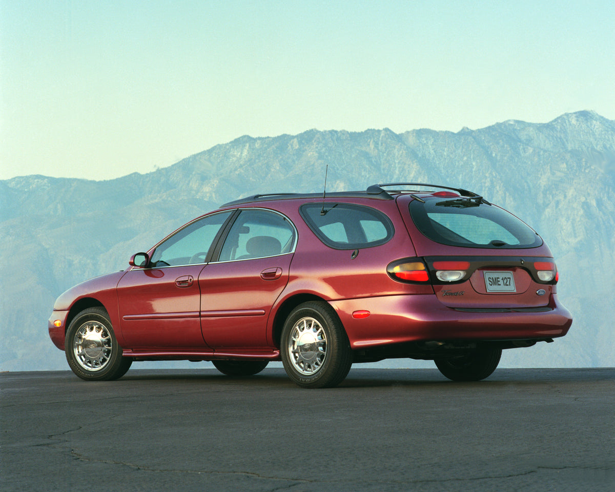 This archival image documents the 1996 Ford Taurus station wagon and is preserved in the Ford Heritage Vault as part of Ford Motor Company's historic photographic archive. Free for personal, non-commercial use. Ford Heritage Vault reference AR-200...