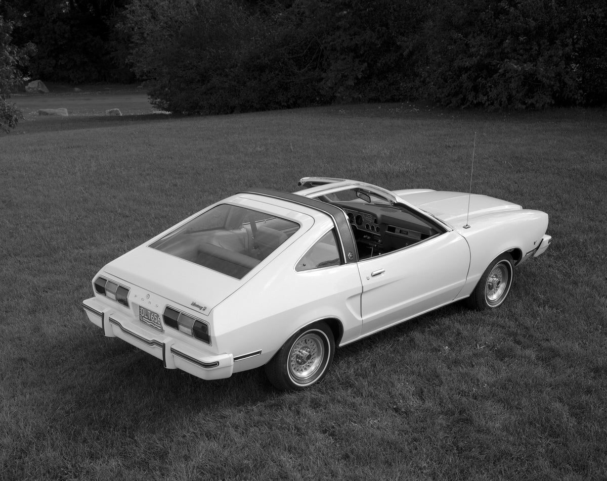 This archival image documents the 1977 Ford Mustang T-Roof and is preserved in the Ford Heritage Vault as part of Ford Motor Company's historic photographic archive. Free for personal, non-commercial use. Ford Heritage Vault reference AR-2008-8.1....