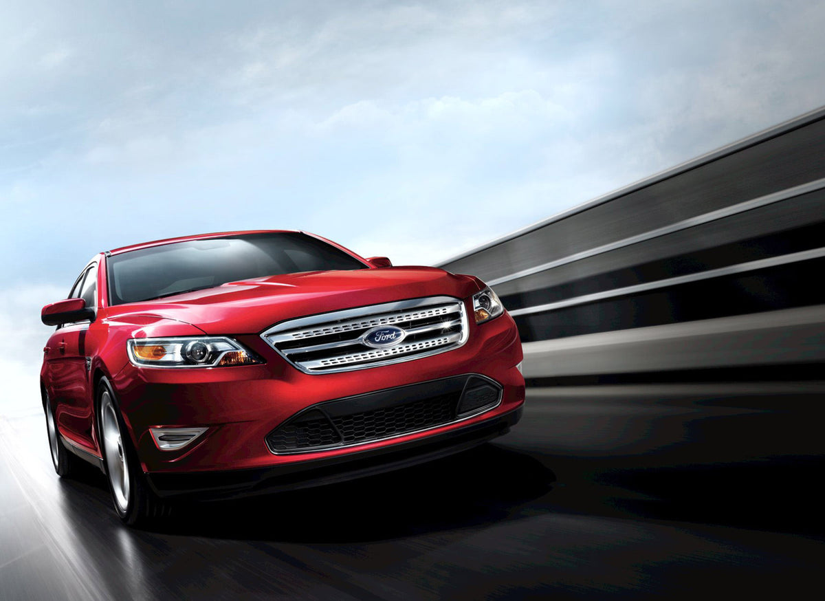 This archival image documents the 2011 Ford Taurus SHO action shot on road MS887942 and is preserved in the Ford Heritage Vault as part of Ford Motor Company's historic photographic archive. Free for personal, non-commercial use. Ford Heritage Vau...