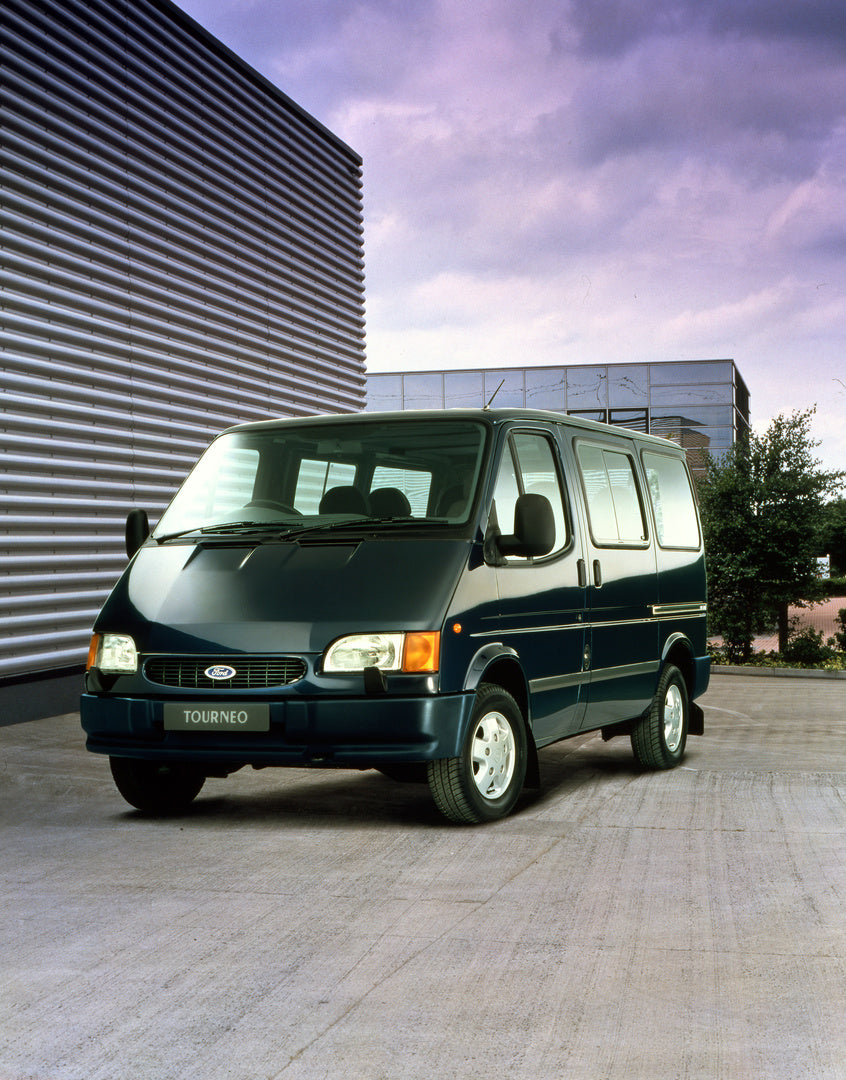 This archival image documents the 1997 Ford Transit Mark III in front of scenic building and is preserved in the Ford Heritage Vault as part of Ford Motor Company's historic photographic archive. Free for personal, non-commercial use. Ford Heritag...
