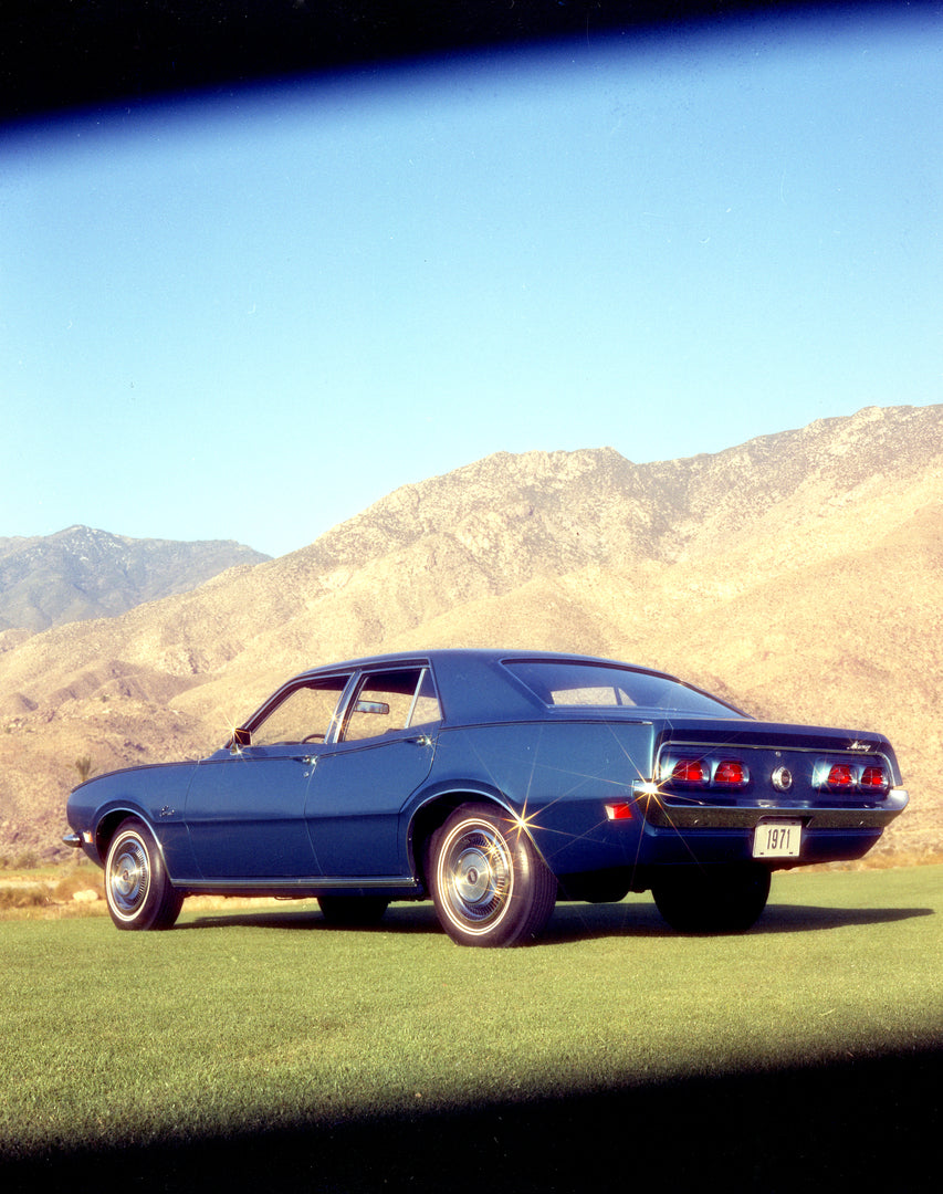 This archival image documents the 1971 Mercury Comet four-door with Mountains in Background Rear View and is preserved in the Ford Heritage Vault as part of Ford Motor Company's historic photographic archive. Free for personal, non-commercial use....