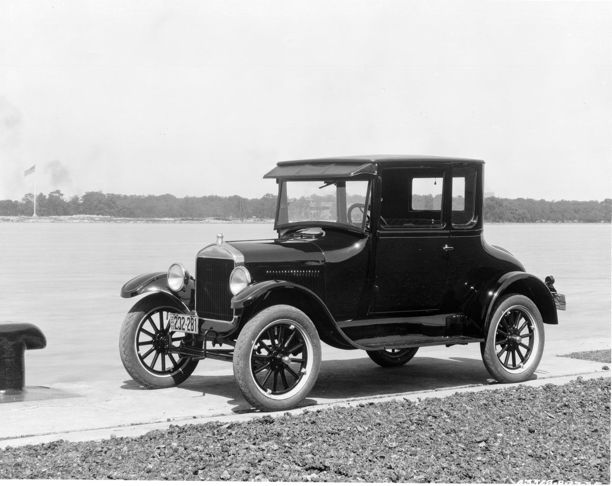 This archival image documents the 1925 Ford Model T Coupe and is preserved in the Ford Heritage Vault as part of Ford Motor Company's historic photographic archive. Free for personal, non-commercial use. Ford Heritage Vault reference AR-2008-8.1.4...